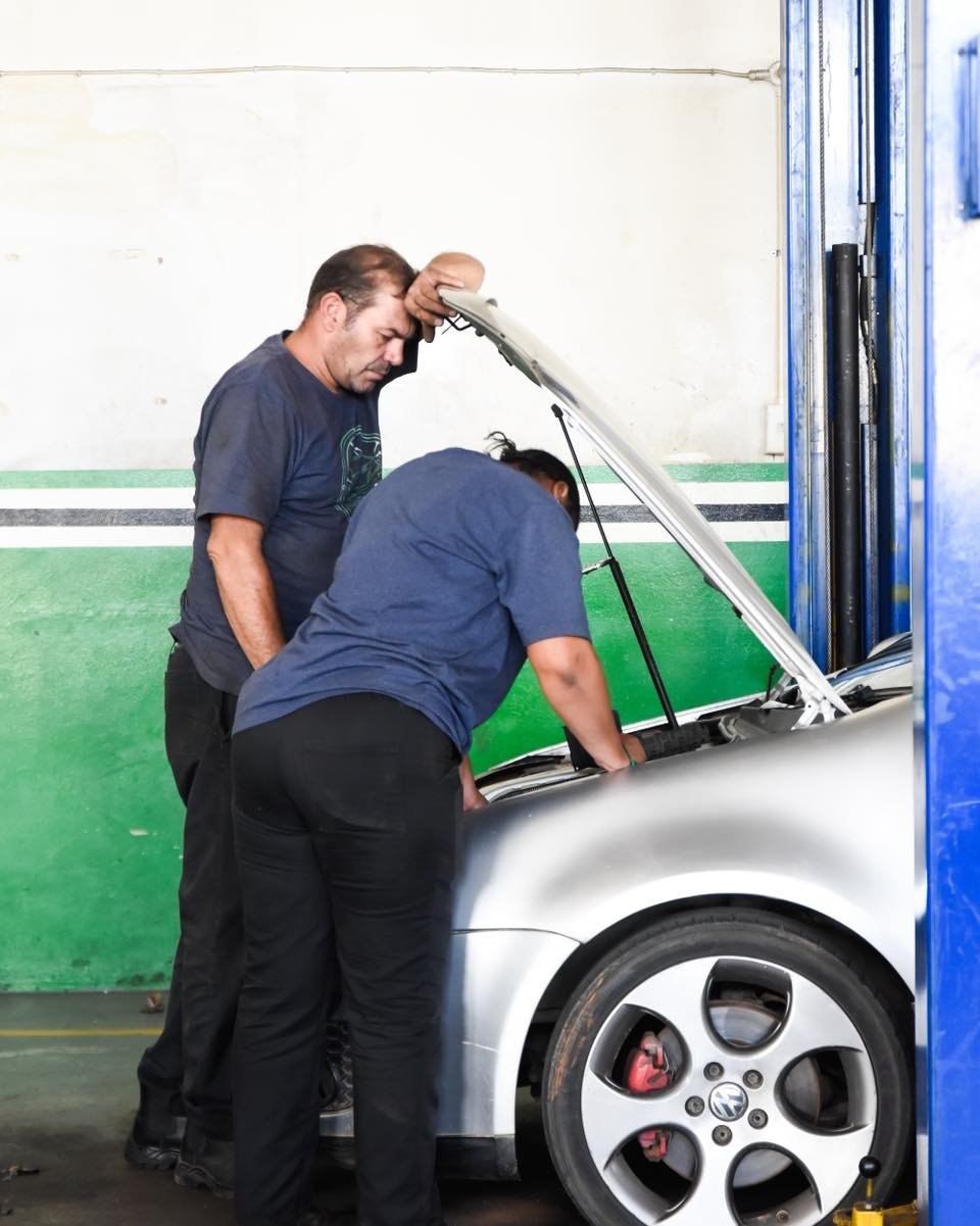 Technicians Working on Vehicle Repairs at Motolek Bloemfontein